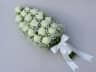 Long casket bouquet of white roses and gypsophila, plain satin ribbon, no text