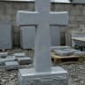 Simple gray granite cross with pedestal, uninscribed